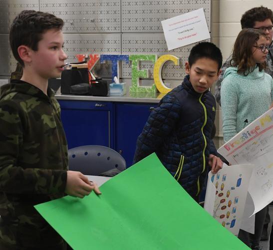 KTEC Computer Science Club students presenting their network design projects.